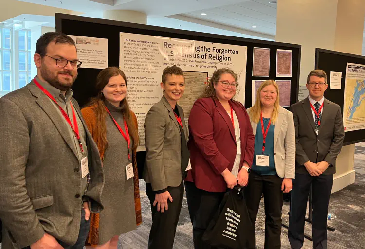 Part of the American Religious Ecologies team, current and former, at AHA 2023. From left to right: Jason Heppler, Caroline Greer, Rachel Birch, Jannelle Legg, Greta Swain, Lincoln Mullen.